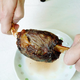 Illustration for article titled Microwaveable Caveman Meat Snacks From Japan